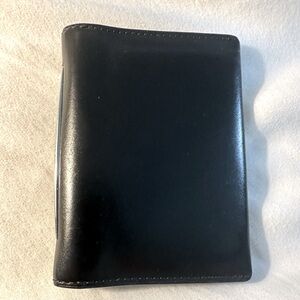 Tumi black smooth calf skin leather